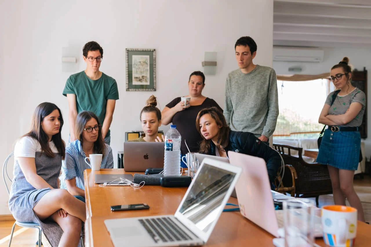 A collaborative digital team around a table